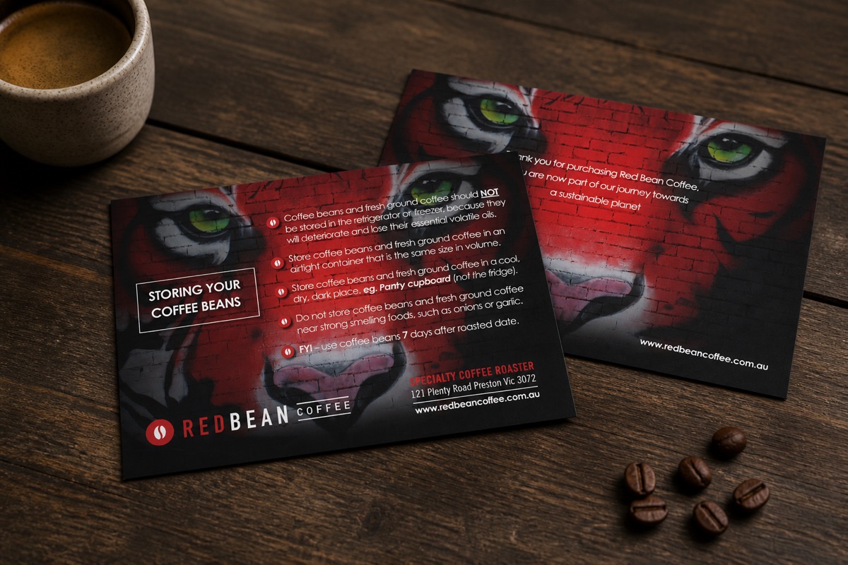 Printed promotional postcards arranged on a café table